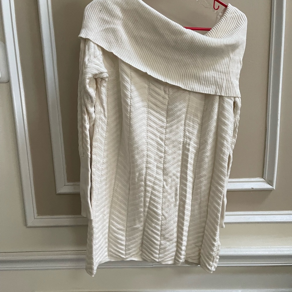 Super sexy sweater worn with leggings